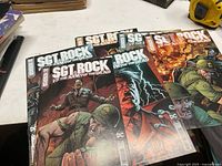 Six comic books from the series Sgt. Rock vs. Army of the Dead showing front covers with detailed war and zombie fight scenes.