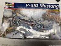 Box of sealed Revell Monogram P-51D Mustang plastic model kit showing front artwork and branding.