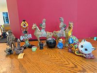 Overview of all 11 figurines on tabletop