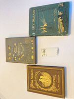 Three gilt-decorated Will Carleton books