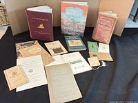 Full lot overview showing books, pamphlets and brochures