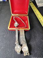 Three vintage women’s wristwatches with red Waltham case