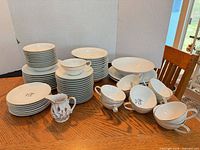Entire dinnerware set arranged on table