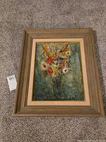 Framed oil painting full view on carpet