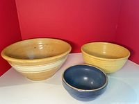 Front view of three bowls showing colors and relative sizes