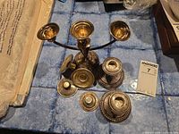 Overhead view of candelabrum, pair of candlesticks and bobeches