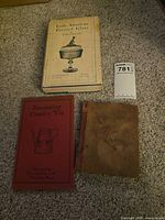 Front view of all three books displaying titles and covers