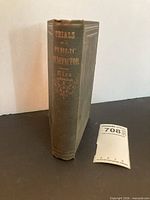Spine showing gilt title Trials of a Public Benefactor by Rice