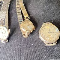 Group shot of three women’s wristwatches