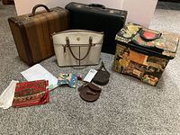 Group shot of tote, three cases, scarves and coin purses