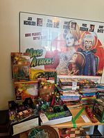 Full view of Mars Attacks poster, action figures, ray gun toy and calendar arranged on table