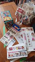 Photo showing Spice Girls stickers collection box, packs, and clear tote bag with Spice Girls print