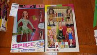 Geri Halliwell glittery green dress concert collection doll in original box with accessories including a microphone and lipstick.