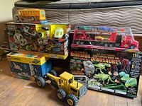 Overview shot showing all items in the lot with packaging and boxes visible.