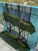 Full curtain panel draped showing tree and landscape print