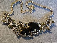 Front view showing stone arrangement and clasp