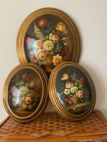 Front view of all three framed prints displayed together