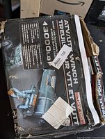 Photo of winch packaging showing the product name, specifications, and image of the winch.