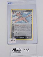 Front photo of Deoxys holo Pokemon card in protective sleeve with price tag $45