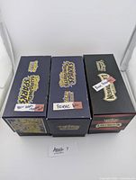 Three stacked boxes labeled for 400+ holos including promo holos, 400 reverse holo cards, and 400 bulk cards from Lost Origin and Sun & Moon series packs.