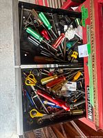 Top drawer with assorted plastic-handled screwdrivers and small bits