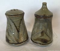 Front view of both Robin Hopper shakers