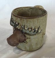 Front view showing moose head detail