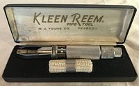 Kleen Reem pipe tool in open case, cloth pad visible