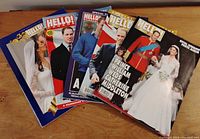 Five Hello Canada magazines fanned out on tabletop