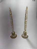 Full view of both lucite candles in stands