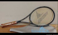 Full view of racquet alongside cover