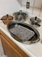group shot of all cookware items on countertop