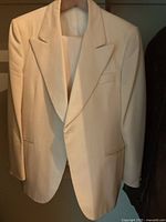 Ivory single-breasted jacket front view