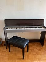 Overall view of Yamaha Arius digital piano and bench