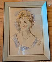 front view of framed portrait drawing
