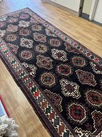 Full-length view of the runner rug on a showroom floor