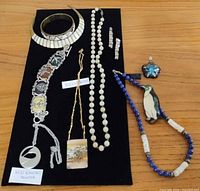 Overview of all jewelry pieces on display board