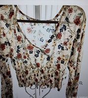 Selfie floral surplice crop top front view