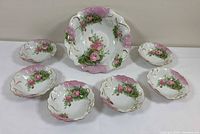 Full set showing one large bowl and six small bowls