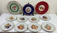 Group shot of all nine plates