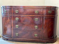 Front view showing drawers, cabinets, hardware