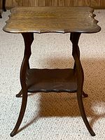 Full view of oak parlour table front angle