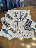 Full set laid out on cloth showing all pieces