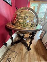 Full view of globe showing cartography and stand