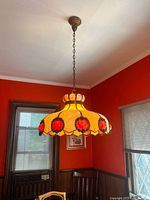Full view of pendant light hanging in room