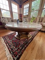 Full view of rug under coffee table showing color and pattern