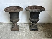 Front view of both planters side by side from a central angle.