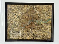 Front close-up photo of framed reproduction 1922 map of London and environs, showing details and condition of frame and matting.