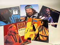 Photo showing all five vinyl record album covers together including Willie Nelson, Buddy Fite, and Sade albums.