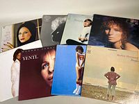 All eight vintage Barbra Streisand vinyl record albums together, showing variety of cover art
